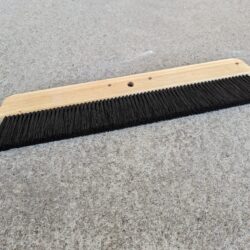 Concrete finishing brush head. Black bristles.