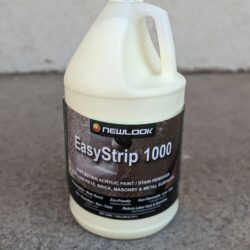 1 gallon bottle of Newlook Easy Strip 1000. It is an opaque cream colored liquid.