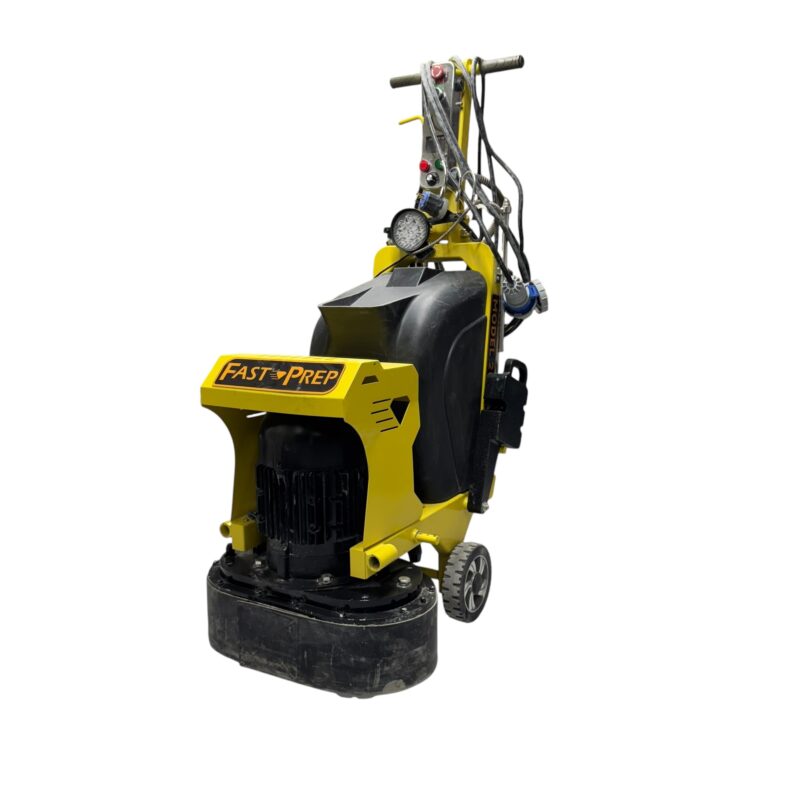 A yellow floor grinding machine labeled "Fast Prep," equipped with handles, control wires, and wheels for mobility, shown against a white background.